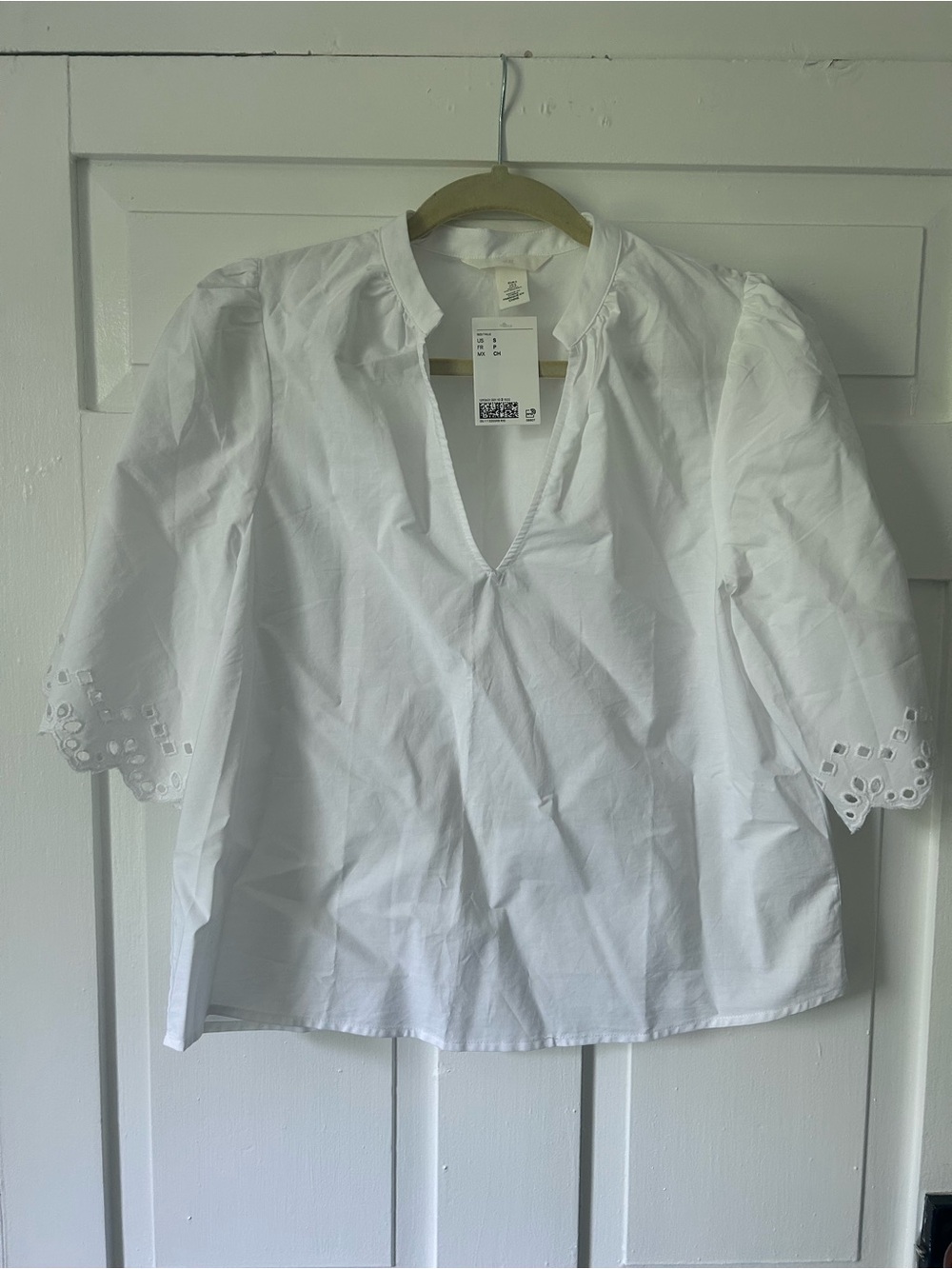 NWT small H&M 100% cotton white eyelet short sleeve top.
